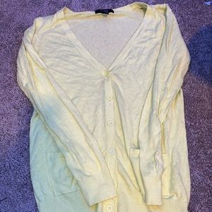 yellow button down sweater
